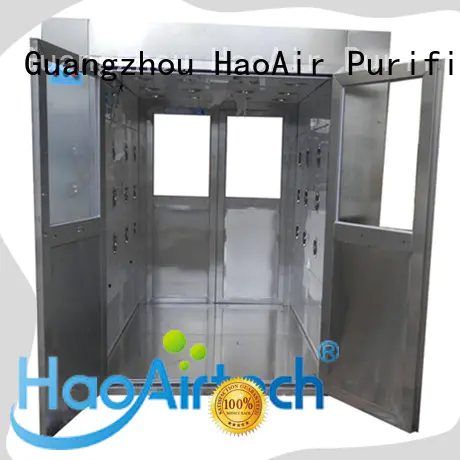 dynamic air shower design with automatic swing door for large scale semiconductor factory